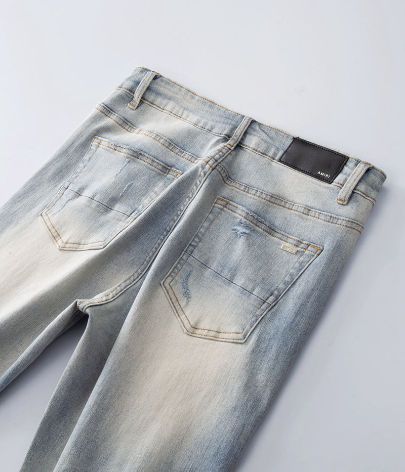 Amiri jeans light gray with diressing