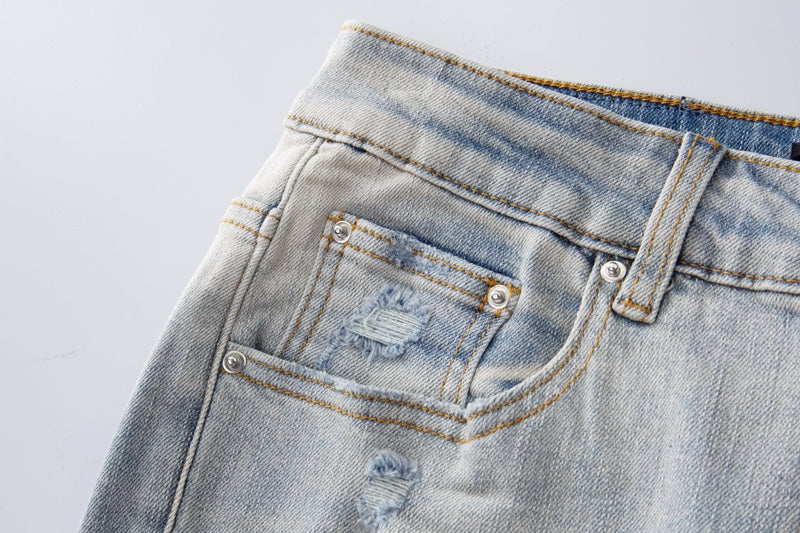 Amiri jeans light gray with diressing